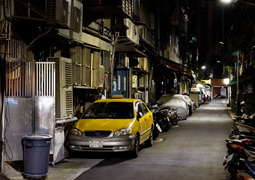 Cars parked in a street at night, Taipei, Taipei, Taiwan