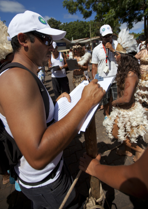 Counting the contesters during tapati festival, Easter Island, Hanga Roa, Chile