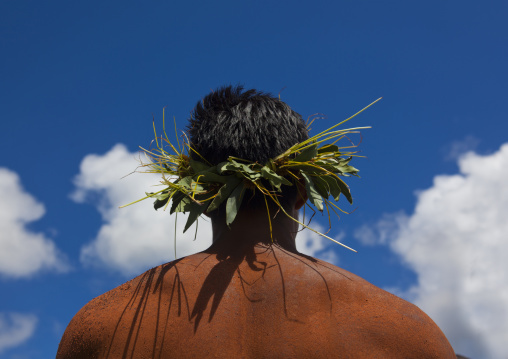 Man with traditional headdress in tapati festival, Easter Island, Hanga Roa, Chile