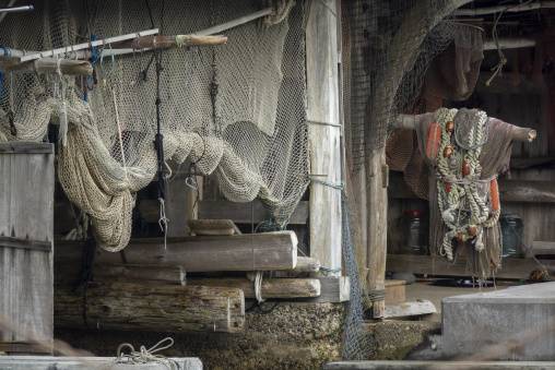Fishing nets hanging inside a traditional funaya boathouse, Kyot
