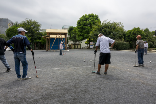 Elderly people playing gateball in a public park, Kanto region,