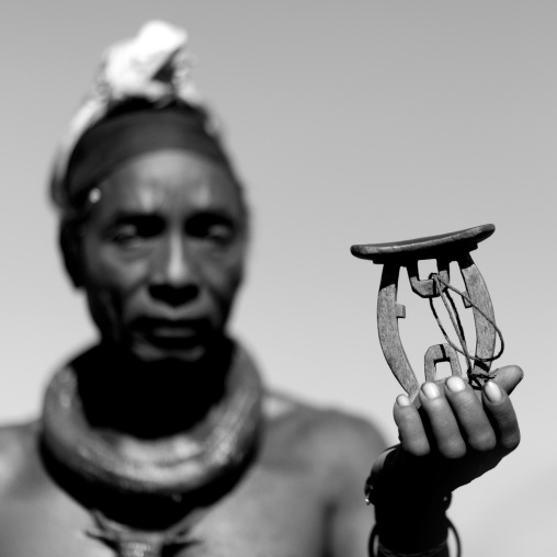 Old Muhimba Man Showing His Headrest, Village Of Elola, Angola