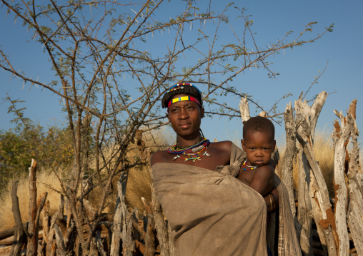 Mucawana Woman With Her Baby In Her Arms, Village Of Mahine, Angola