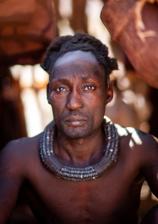 Himba tribe man with the traditional necklace, Cunene Province, Oncocua, Angola