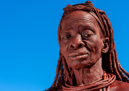 Portrait of a Himba tribe woman covered with otjize, Cunene Province, Oncocua, Angola