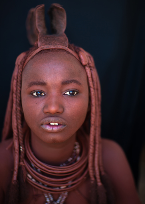 Portrait of a Himba tribe woman covered with otjize, Cunene Province, Oncocua, Angola