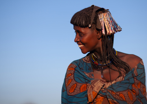 Portrait of a smiling Muhacaona  tribe woman, Cunene Province, Oncocua, Angola