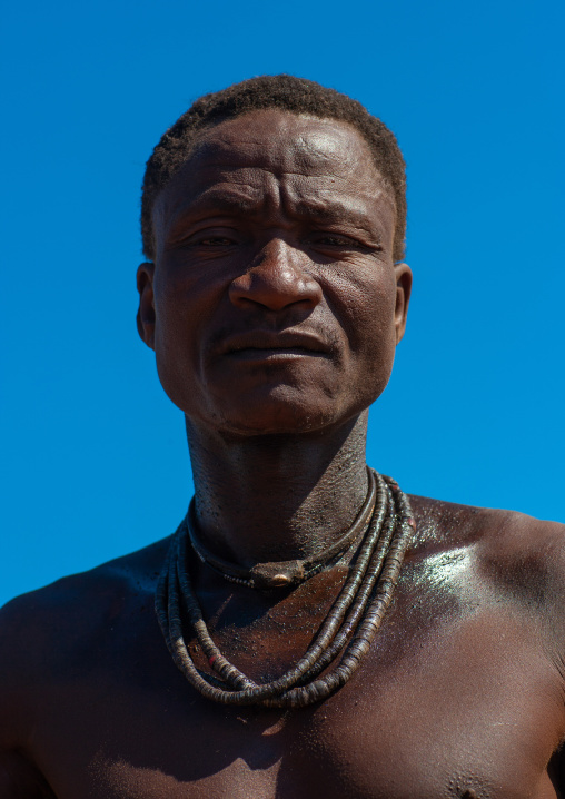 Portrait of a Himba tribe man, Cunene Province, Oncocua, Angola