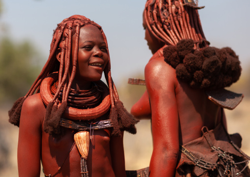 Himba tribe women covered with otjize, Cunene Province, Oncocua, Angola
