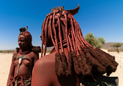 Himba tribe women covered with otjize, Cunene Province, Oncocua, Angola