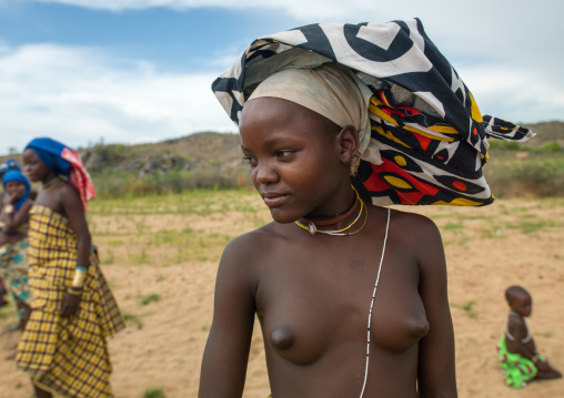 Portrait of a Mucubal tribe women wearing colorful headwears, Namibe Province, Virei, Angola
