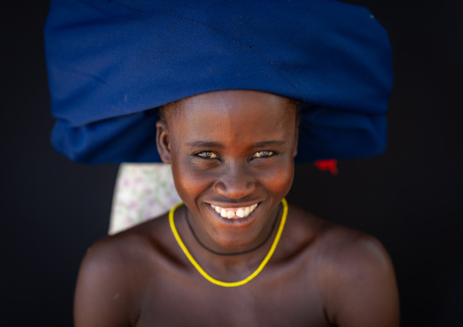 Mucubal tribe woman wearing a blue headwear, Namibe Province, Virei, Angola