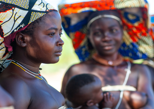Portrait of a Mucubal tribe women wearing colorful headwears, Namibe Province, Virei, Angola