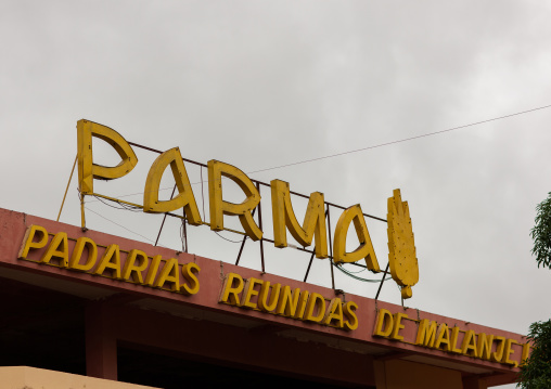 Parma billboard on the top of a building, Malanje Province, Malanje, Angola