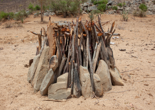 Shelter made with wood and stones to protect the chickens, Namibe Province, Virei, Angola