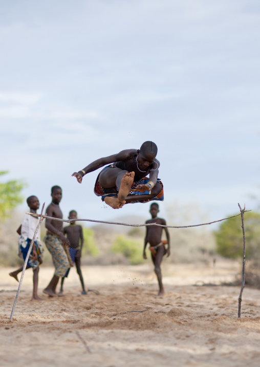 Mukubal Kids Doing High Jumping, Virie Area, Angola