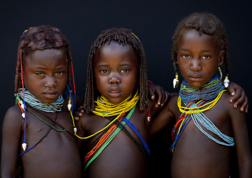 Mwila Girls With Traditional Hairstyle And Beaded Necklaces, Angola