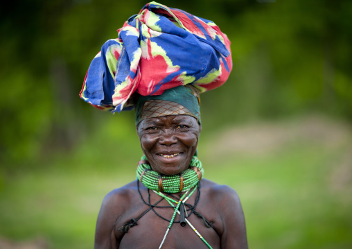 Old Mugambue Woman  Carrying A Bundle On Her Head, Angola