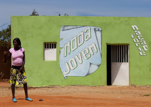Pregnant Woman In Front Of A Clothes Store, Lubango, Angola