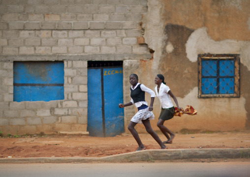 Girls Running In The Streets Of Huambo, Angola