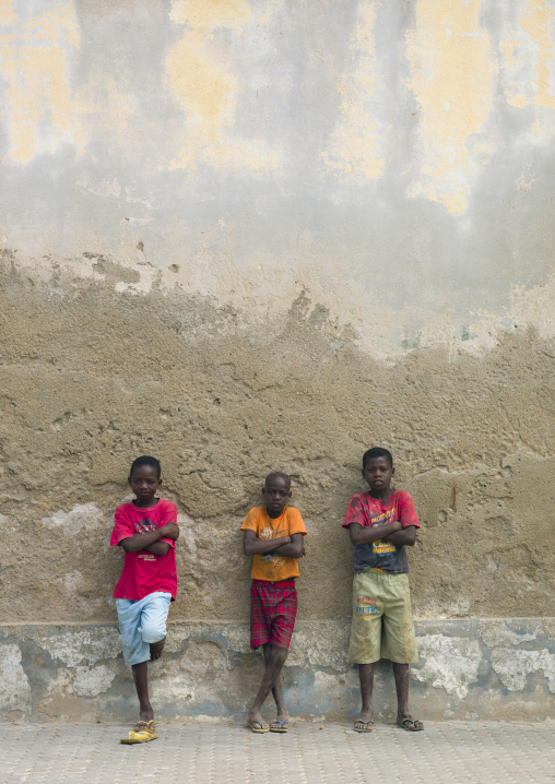 Three Boys Leaning On A Wall, Benguela, Angola
