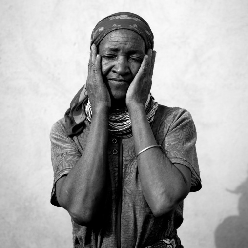 Old Mwila Woman With Vilanda Necklace At Huila Town Market, Angola