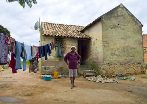 Woman Who Just Hung Out Washing In Front Of Her House, Village Of Caconda, Angola