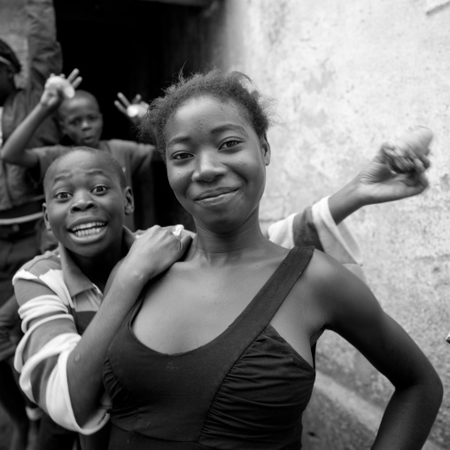 Woman And Boy Smiling In The Village Of Caconda, Angola