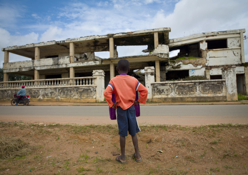 Boy In Front Of The Former House Of Jonas Savimbi, Huambo, Angola
