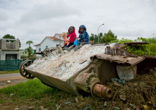 Kids On A Tank Wreck From Civil War, Angola