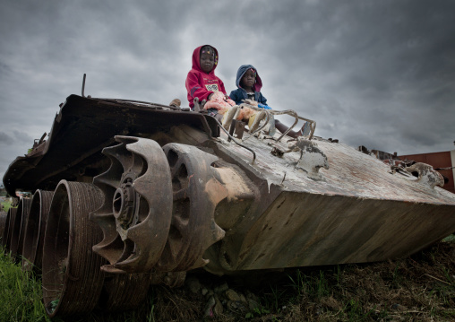 Kids On A Tank Wreck From Civil War, Angola