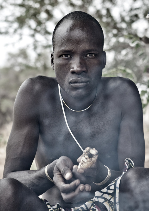Mucubal Man With Cooked Corn In The Hands, Virie Area, Angola