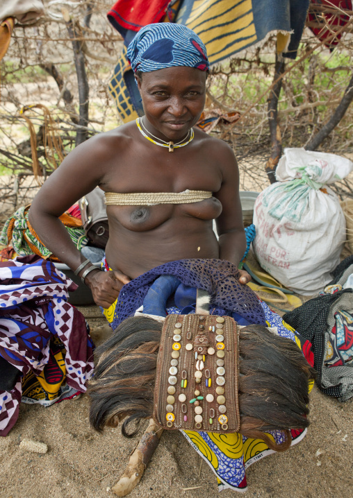 Mucubal Woman With A Headdress Made Of Cow Tails On Her Knees, Virie Area, Angola