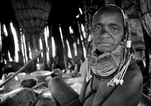 Old Mwila Woman Cooking In Her Hut, Chibia Area, Angola