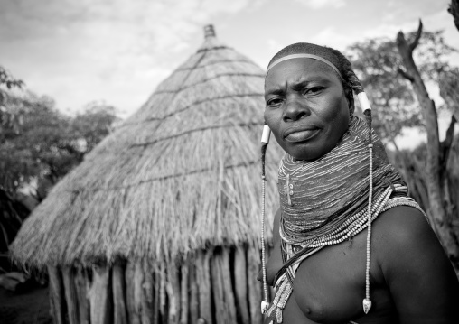 Mwila Woman With A Vilanda Necklace In Front Of Her Hut, Chibia Area, Angola