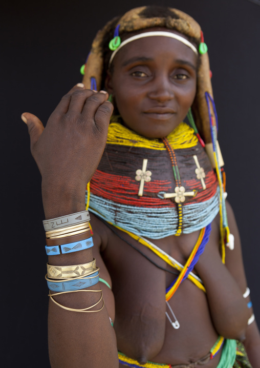 Mwila Woman Showing Her Bracelets, Chibia Area, Angola
