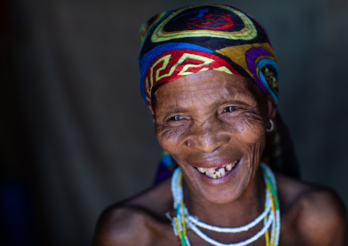 San tribe woman smiling portrait, Huila Province, Chibia, Angola
