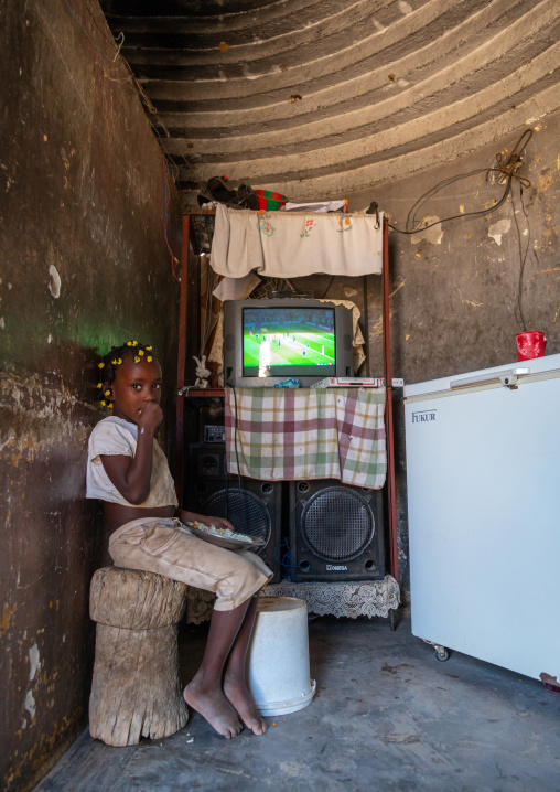 Angolan girl living in an experimental house for the local people built by the portuguese, Namibe Province, Caraculo, Angola