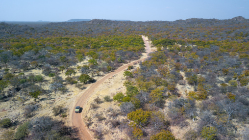 Aerial view of a dirt road in the bush, Cunene Province, Oncocua, Angola