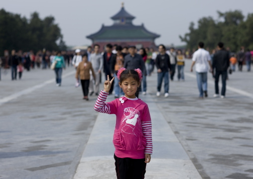 Girl Saluting In Front Of Temple Of Heaven, Beijing, China