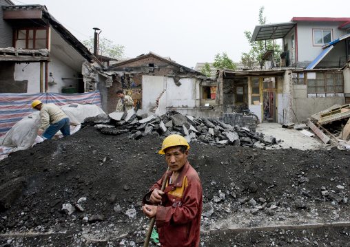 Manual Worker On A Demolition Site, Beijing, China