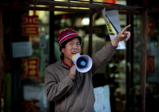 Seller Shouting In A Loudspeaker, Beijing China