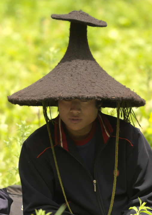 Shaman During A Ceremony, Lugu Lake, Yunnan Province, China