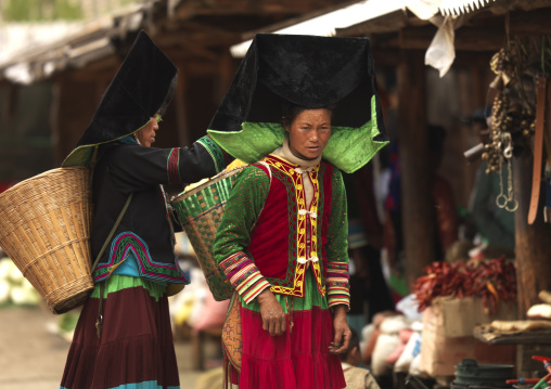 Yi Tribal Women In Traditional Clothes In A Market, Yongning, Yunnan Province, China
