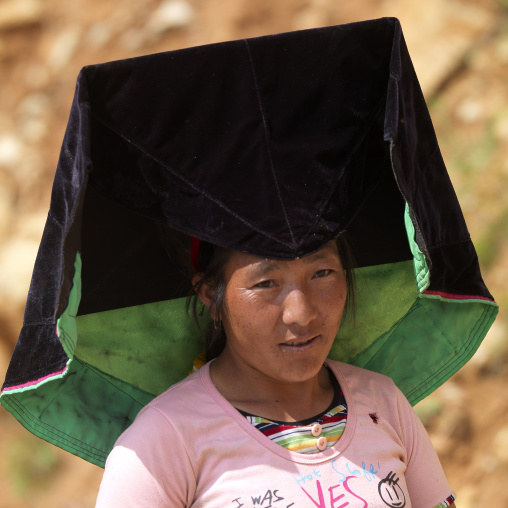 Yi Tribal Woman In Traditional Clothes, Yongning, Yunnan Province, China