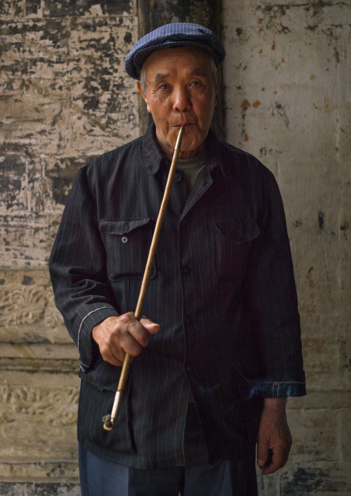 Old Man Smoking A Long Pipe, Tuan Shan Village, Yunnan Province, China