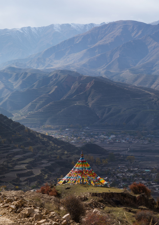 Prayer flags over the mountain in Chonjgon monastery, Tongren County, Longwu, China