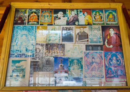 Pictures of Dalai Lama inside Wutun si monastery, Qinghai province, Wutun, China