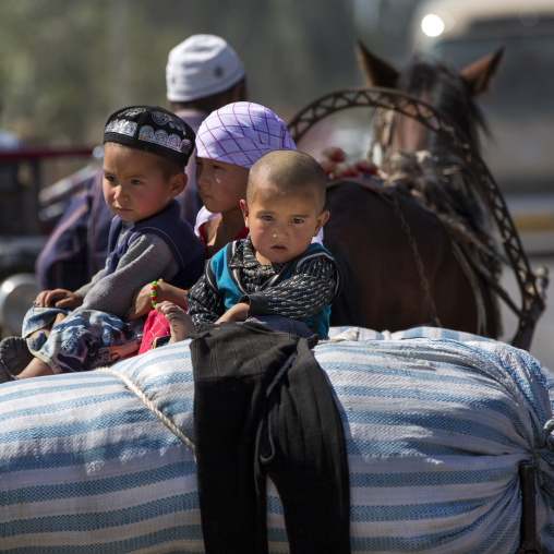 Uyghur Kids On A Horse Pulled Cart, Yecheng, Xinjiang Uyghur Autonomous Region, China