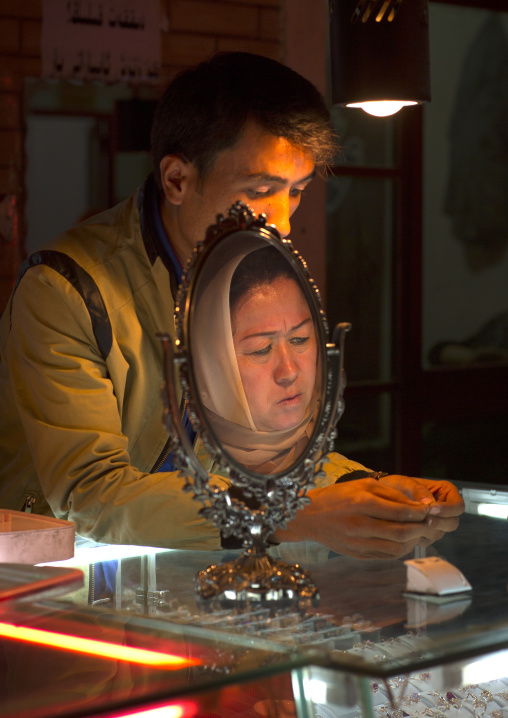 woman head Reflecting In The Mirror, Gold Bazaar, Kashgar, Xinjiang Uyghur Autonomous Region, China